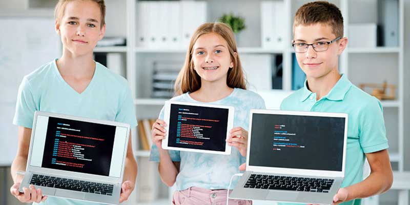 kids holding computers, coding, laptops and tablets